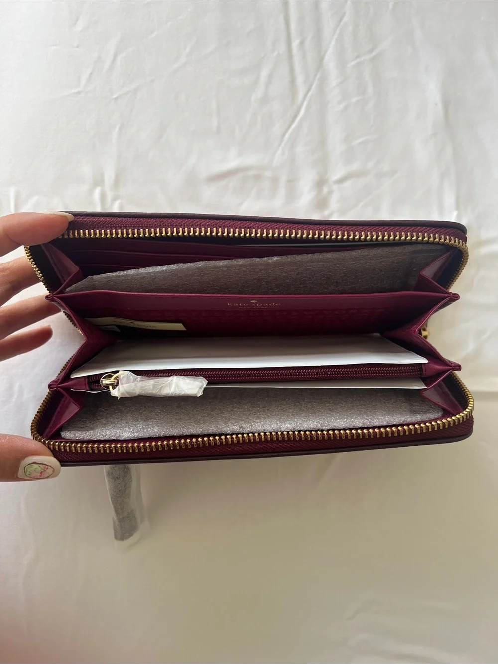 kate spade Neda Chester Street Zip Around Wallet in Deep Wine with Gold Hardware